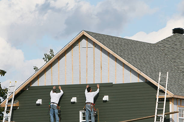 Professional Siding Contractor technician working in Howell, NJ